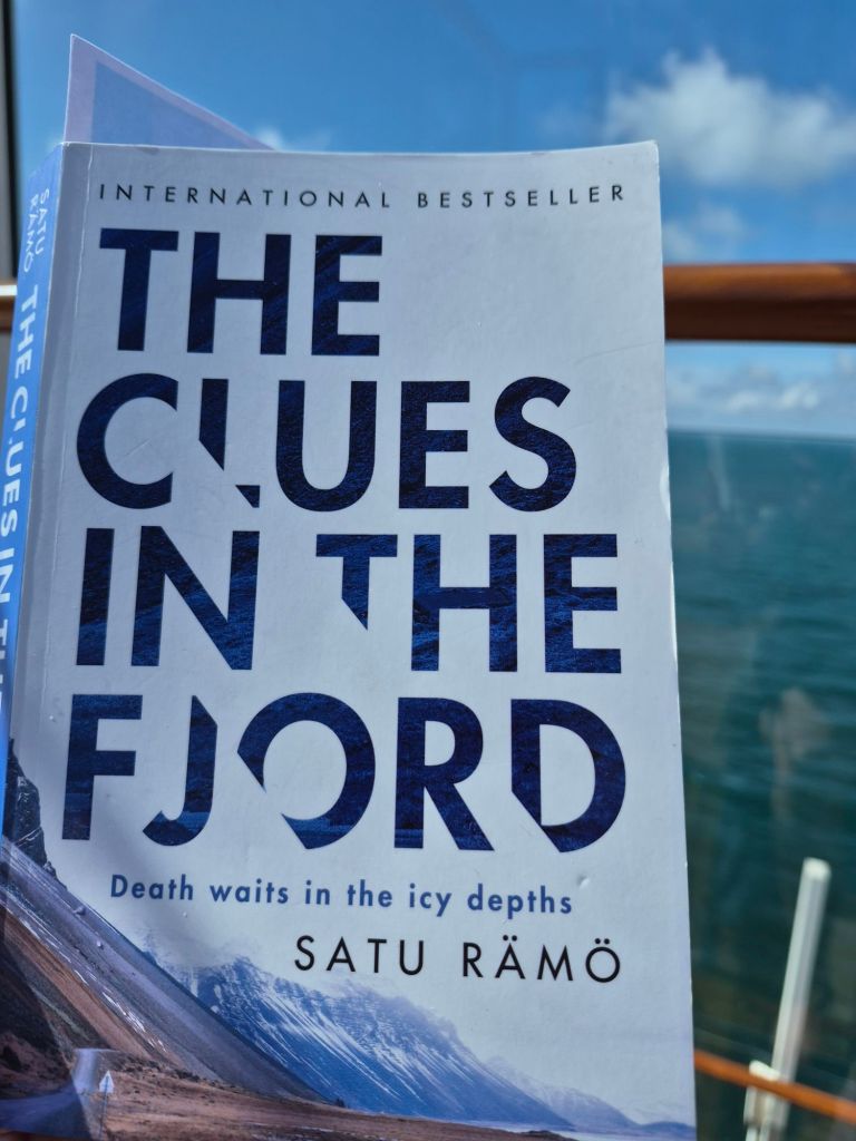 cover of fjords with sea in background